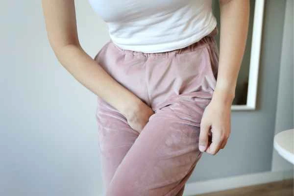 woman struggling with urine incontinence ENGLAND