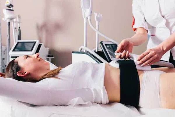woman having body sculpting to help improve her body image and her mental health ENGLAND
